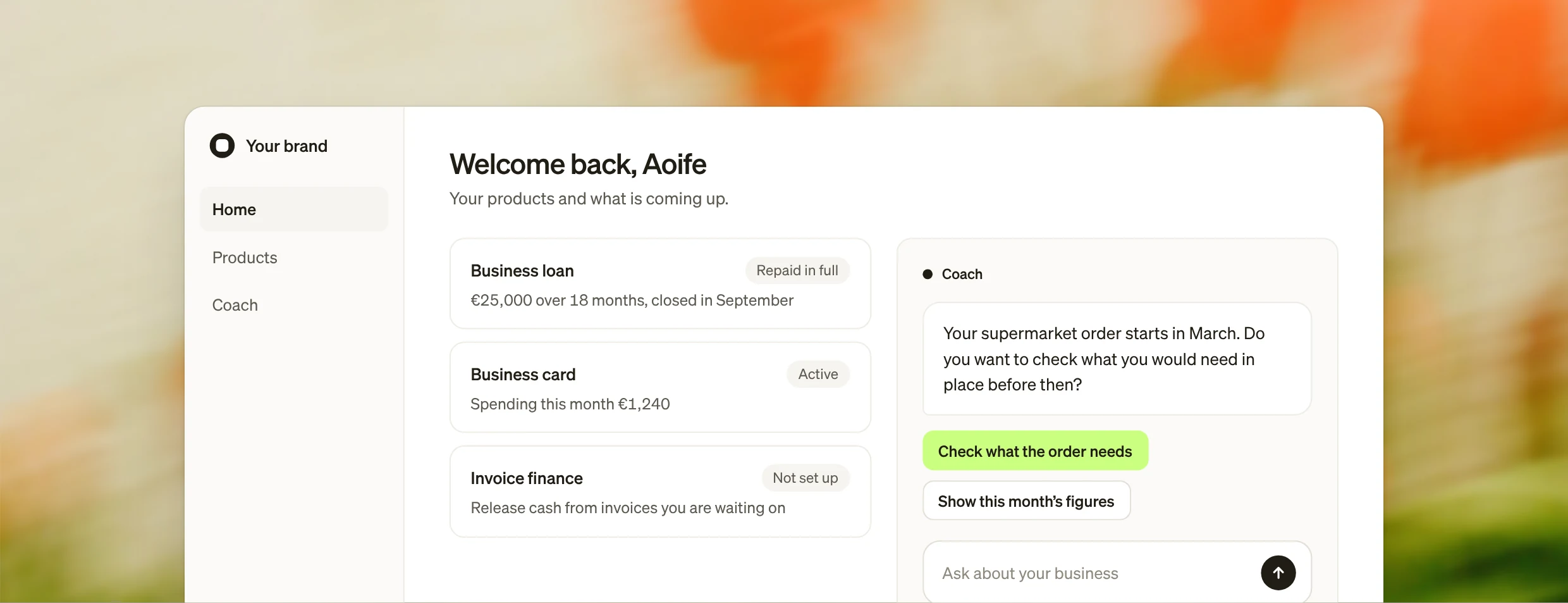 A digital finance provider’s app showing Aoife’s products, including a business loan repaid in full, beside a Coach message asking whether she wants to check what her supermarket order will need.